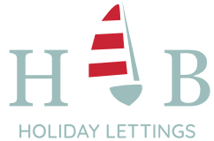 A logo for holiday lettings with a sailboat on it