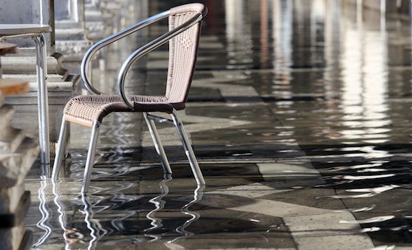chair stands in flooded office building