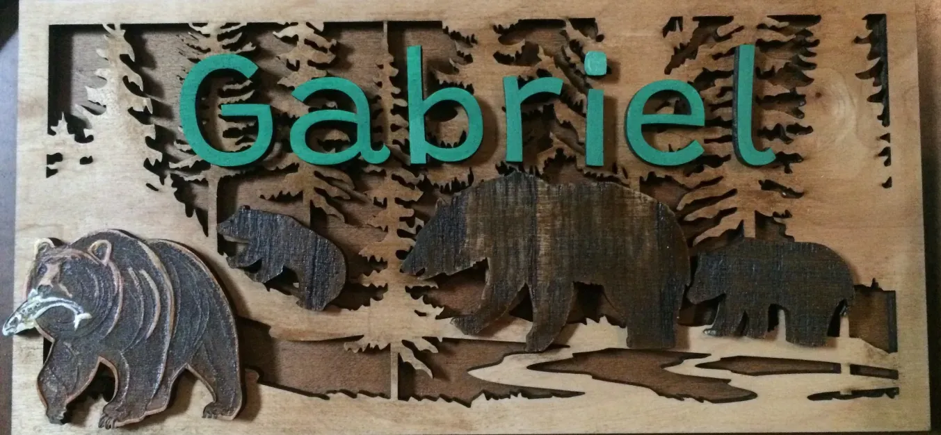 A wooden sign with the name gabriel on it
