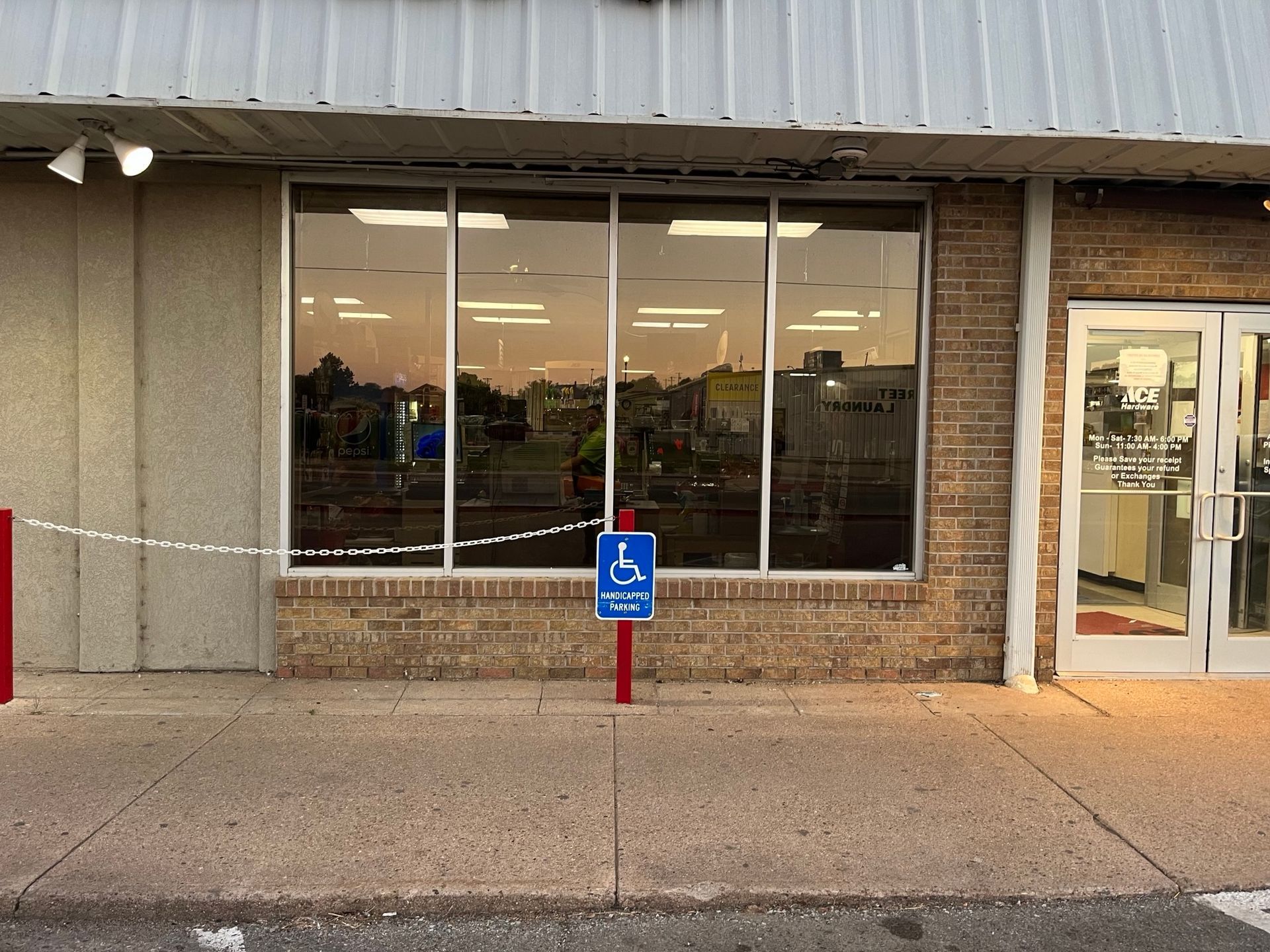 A building with a handicapped sign in front of it