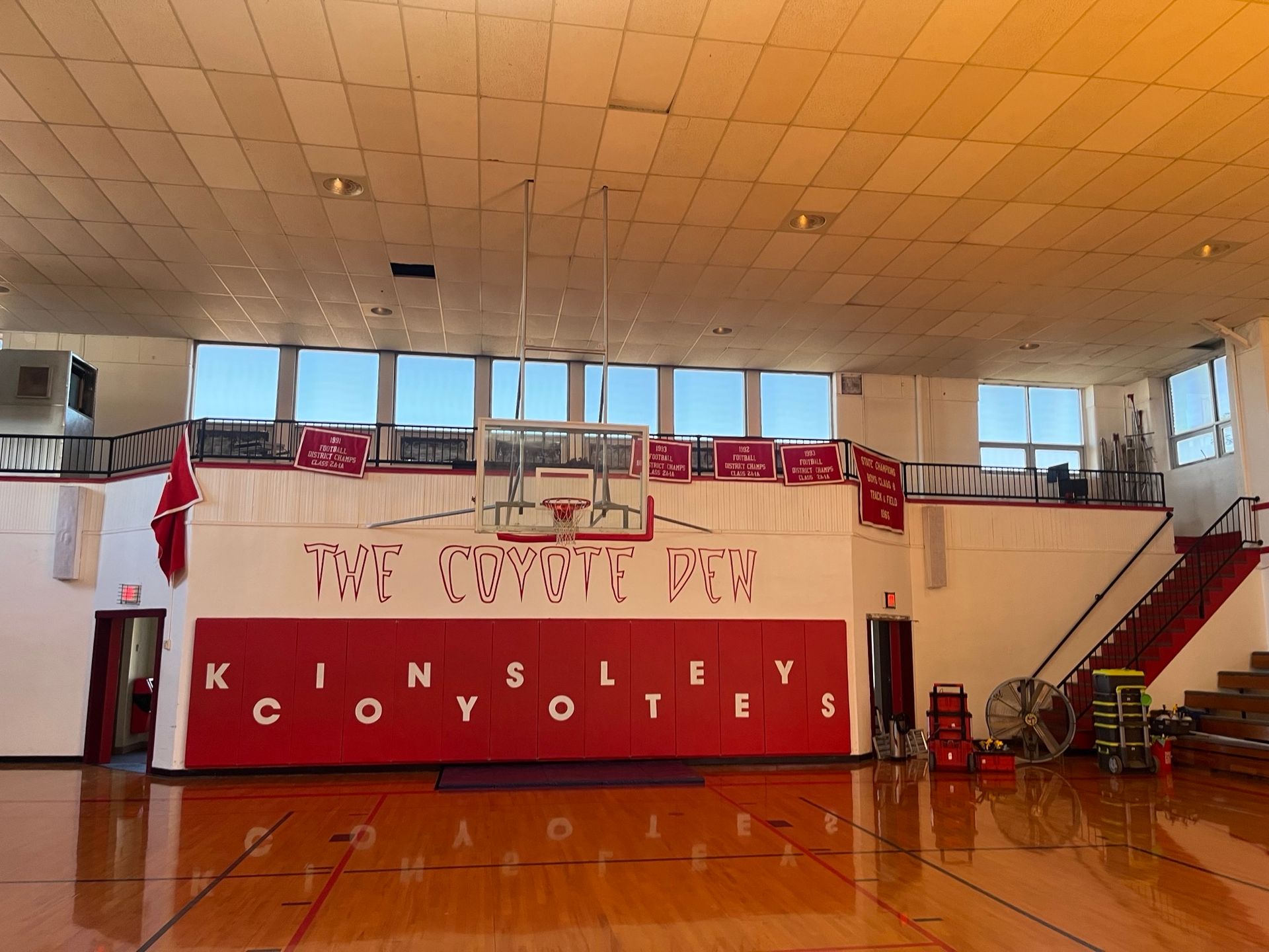 A gym with a sign that says the coyotes on it