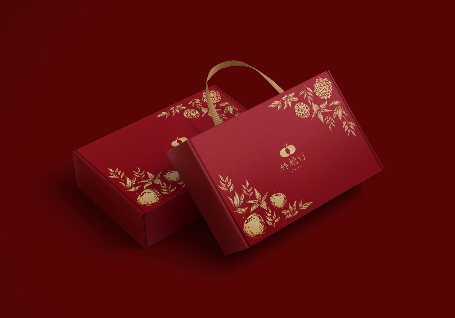 Two red gift boxes with gold floral patterns and a ribbon handle, set against a matching deep red background.