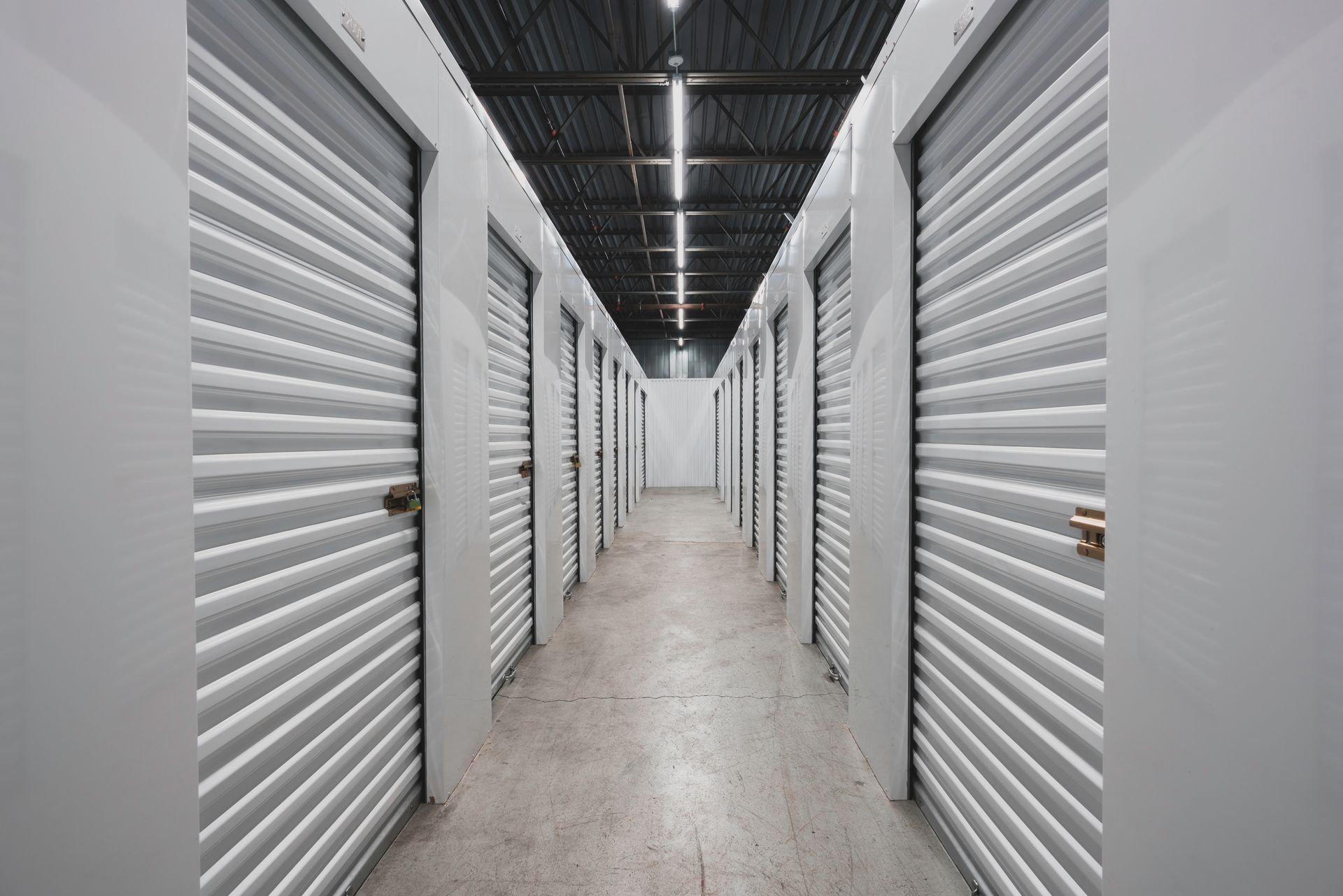 Interior view showcasing self-storage facility doors with safety locks.
