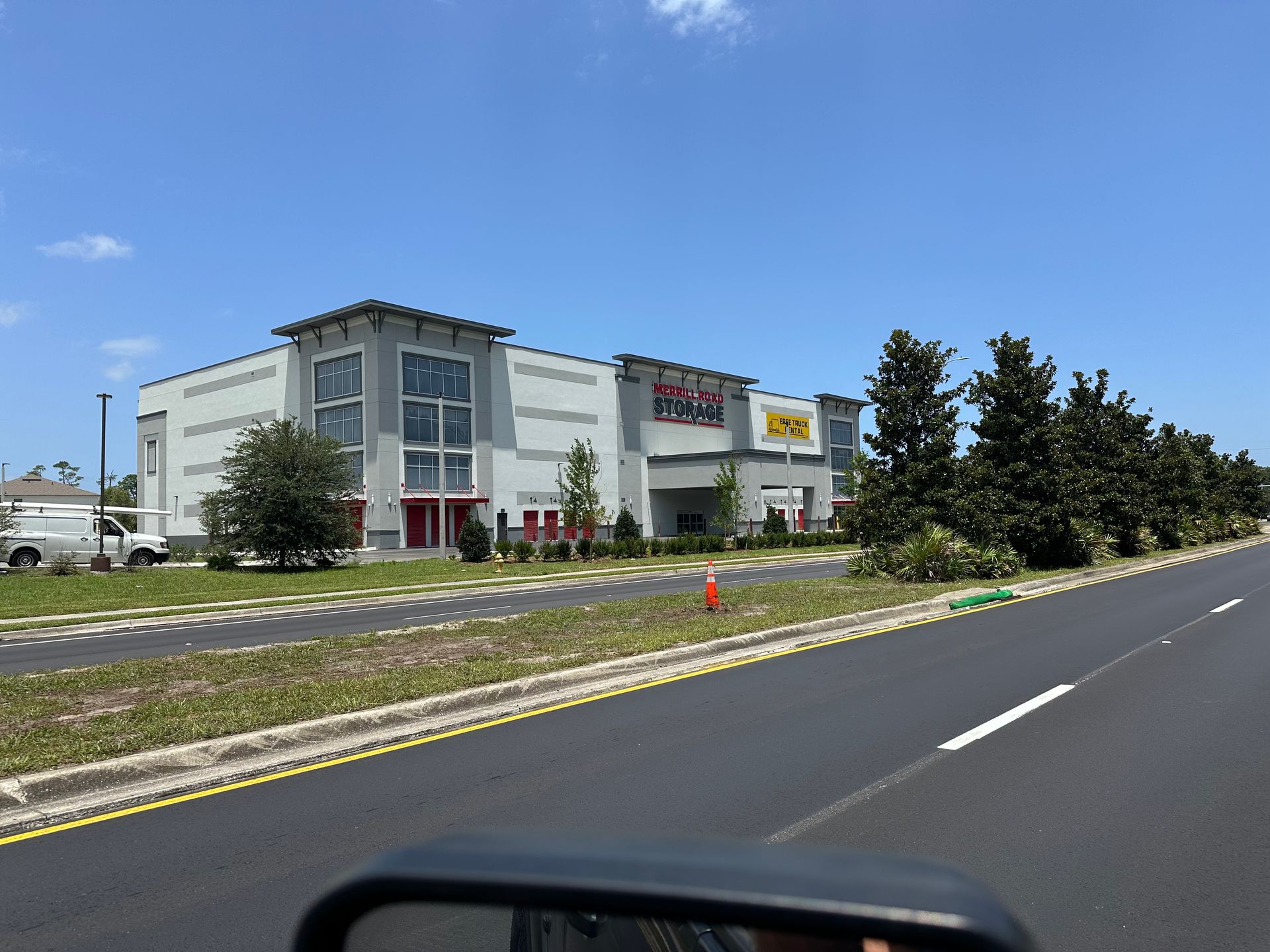 A large white building with the word mega on it