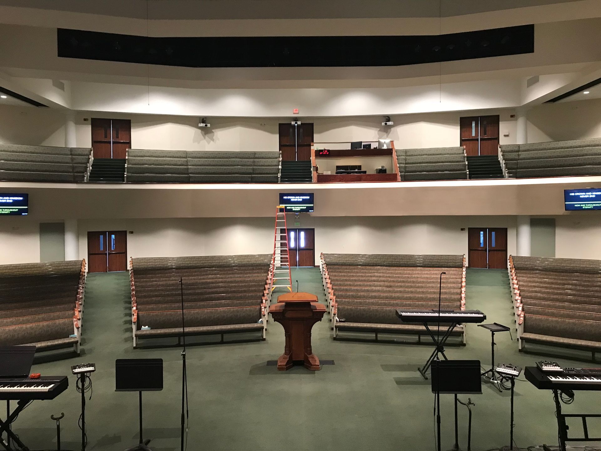 An empty auditorium with a podium in the middle