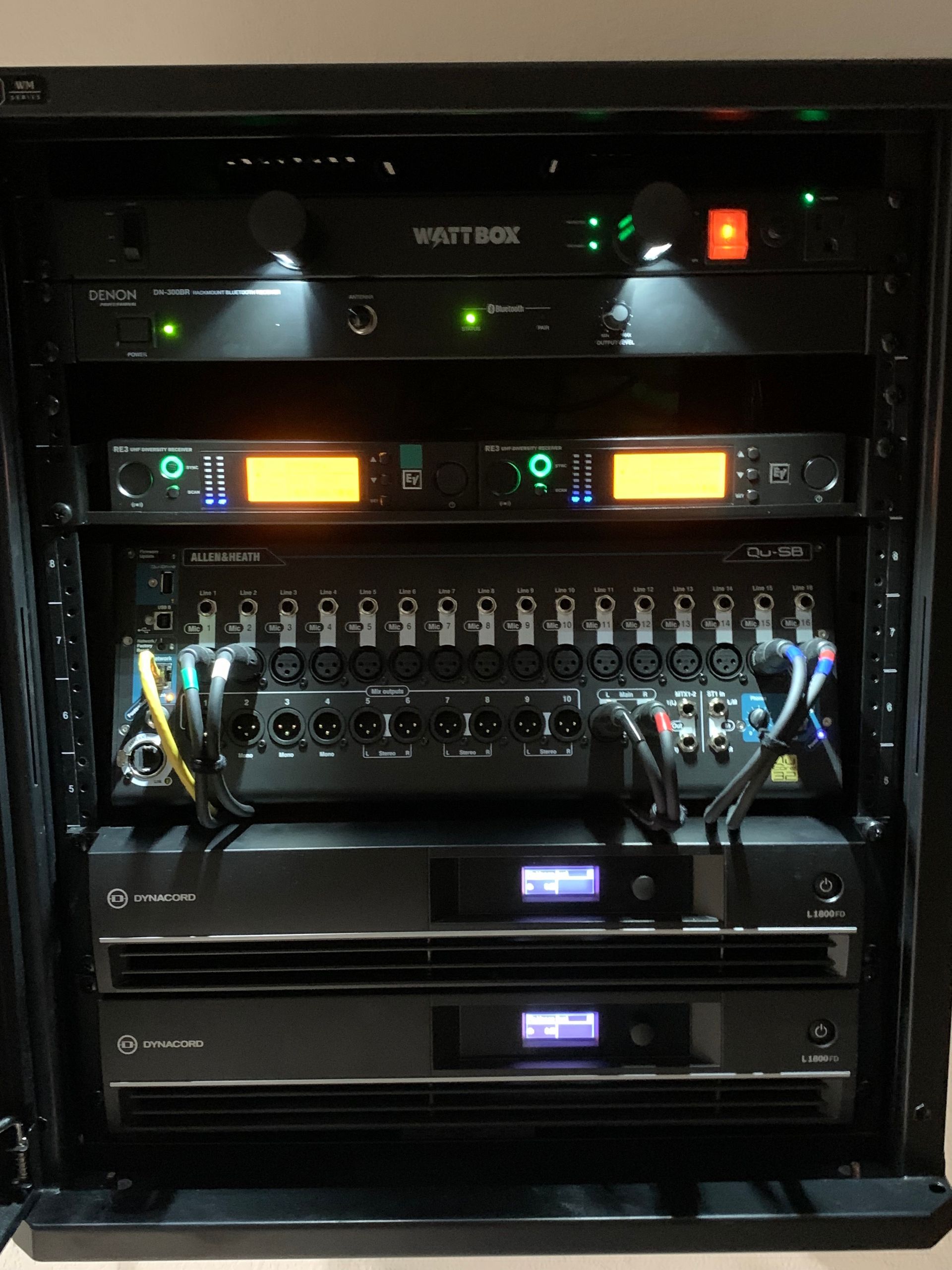 A rack with a vault box on top of it