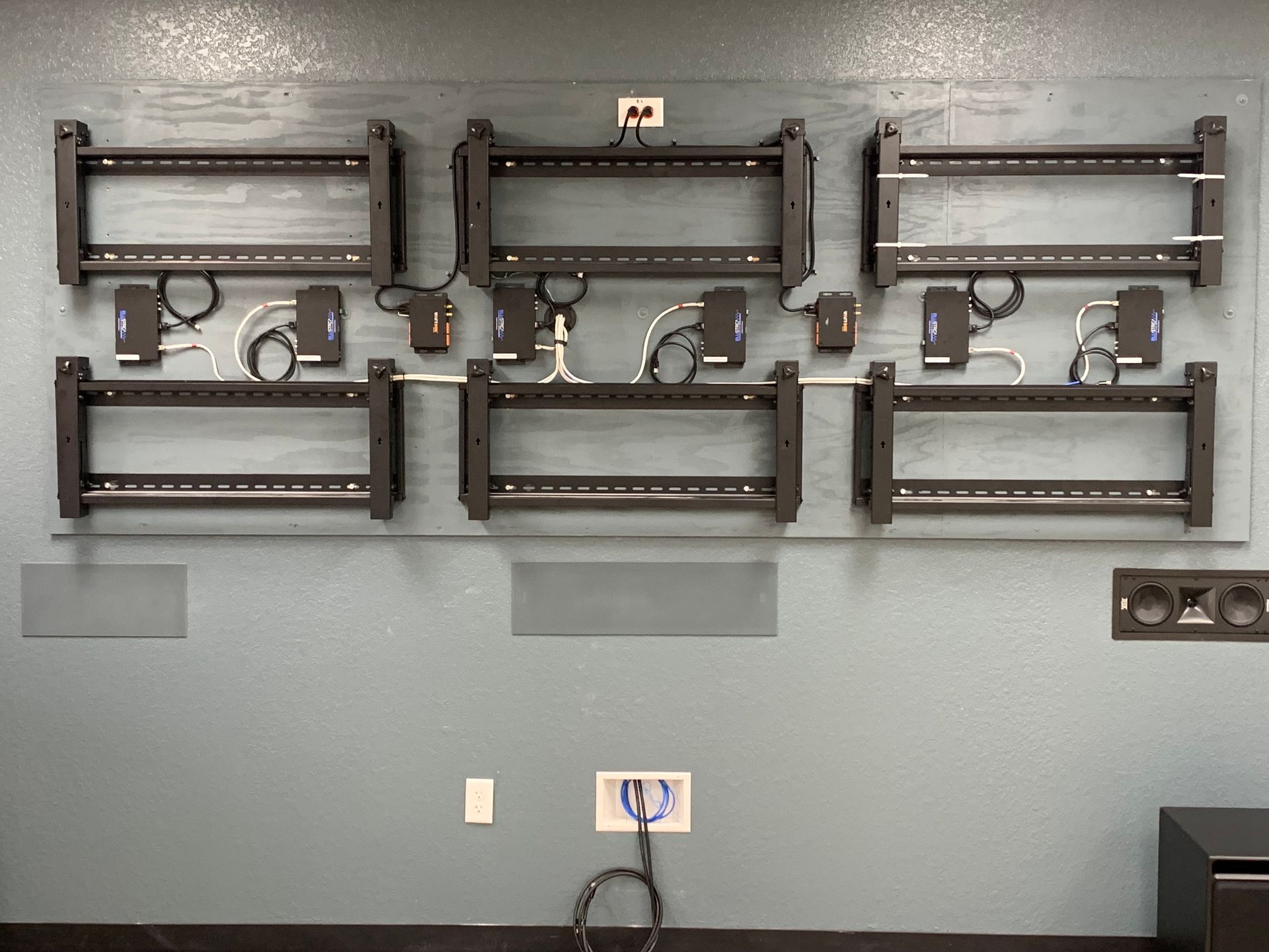 A wall with a bunch of shelves on it