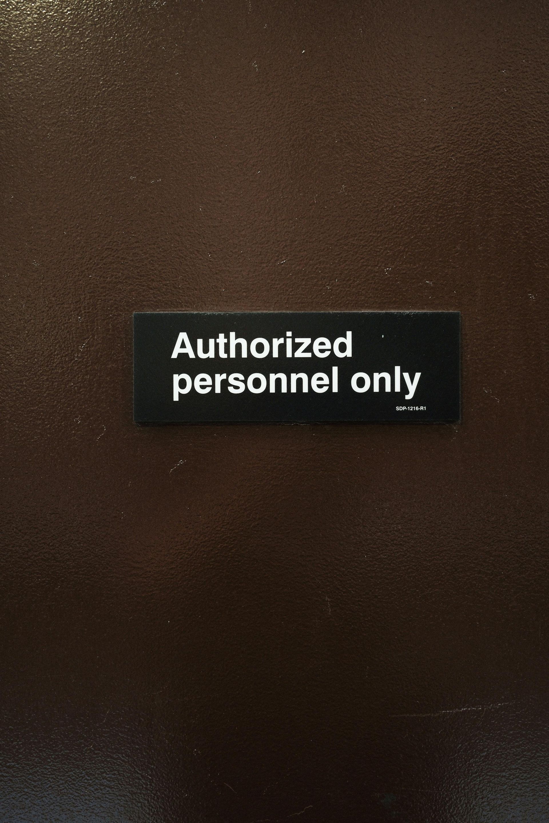 A sign that says authorized personnel only on it