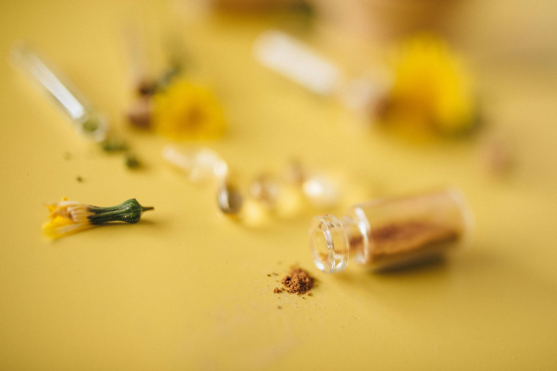 A close up of a bottle of pills on a table.