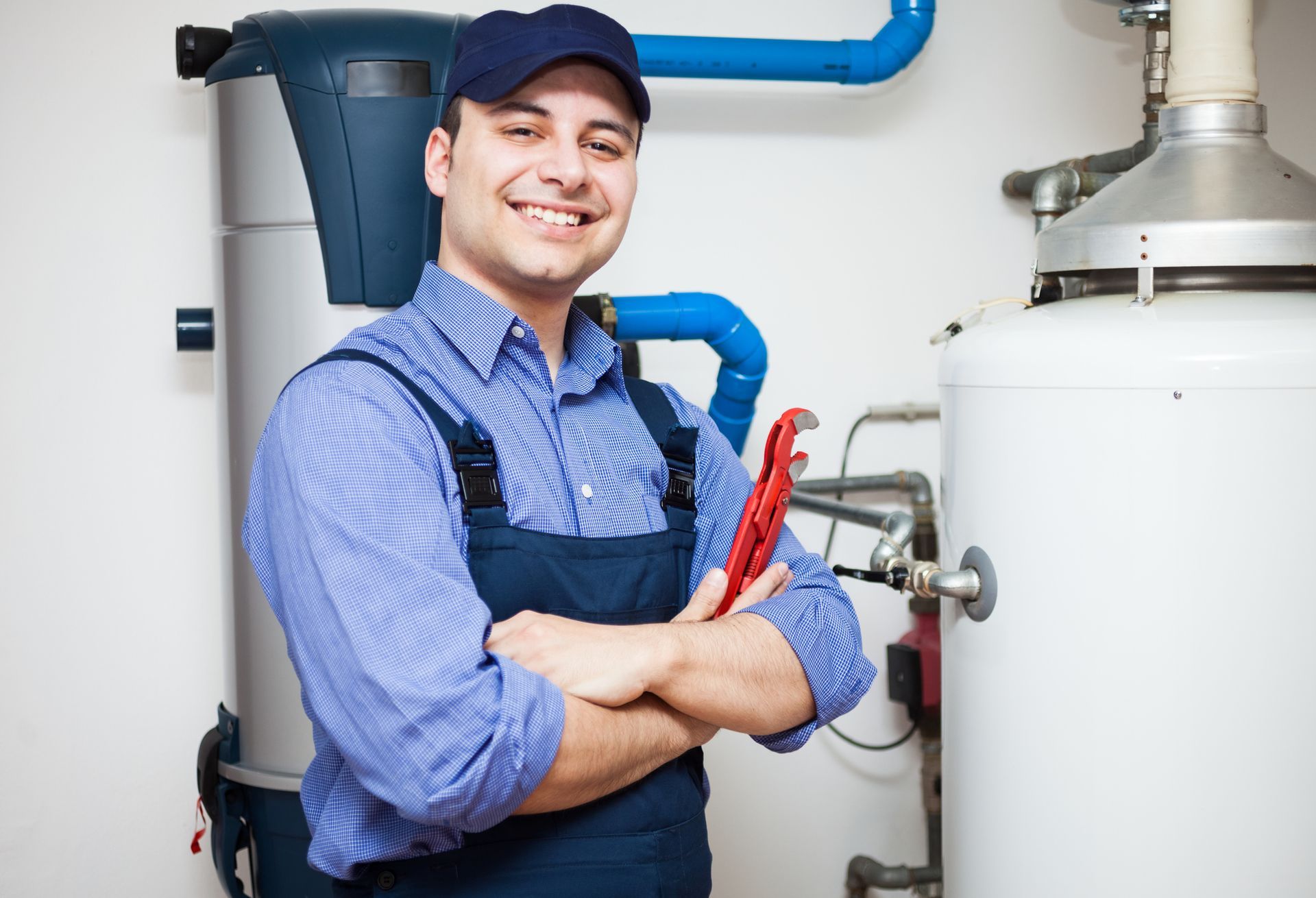 HVAC technician inspecting a furnace for emergency heater repair in Staten Island.