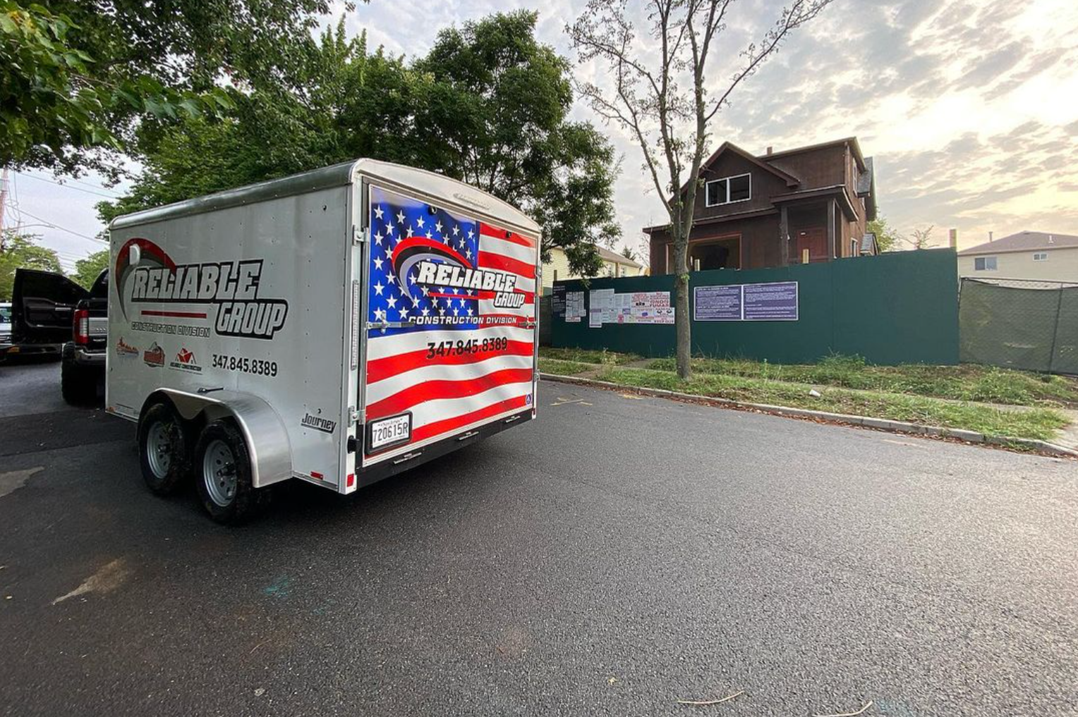 HVAC technicians working together on a rooftop unit in Staten Island, NY.