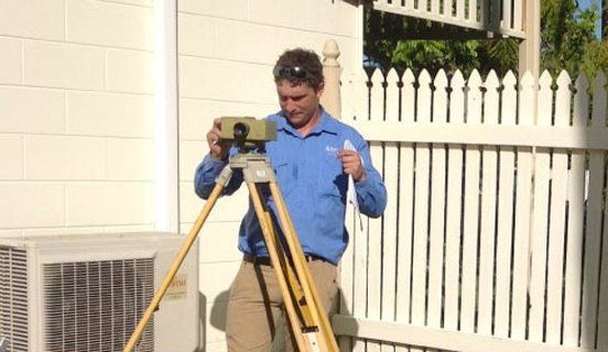 Male Using a Survey Equipment — Townsville, QLD — Atkinson Surveys