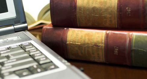 Laptop and law books for an attorney in Sweet Home, OR