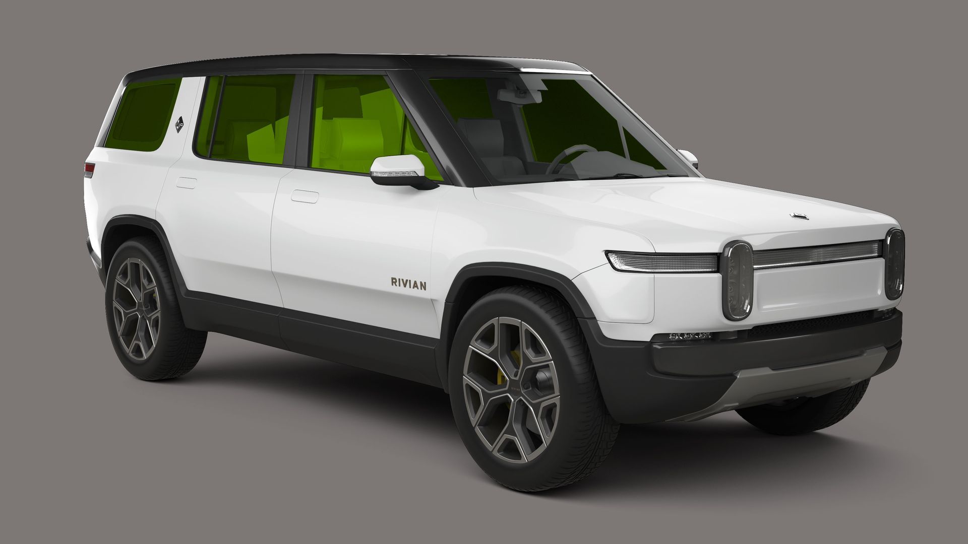 A white suv with green seats is on a gray background.