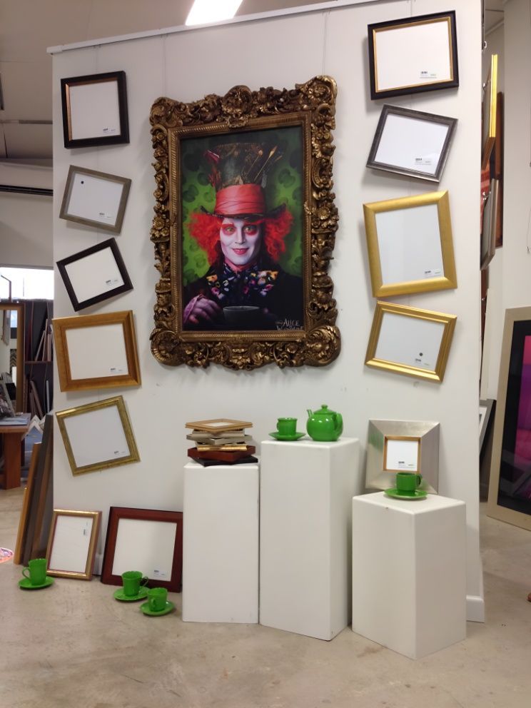 A Picture Of Mad Hatter Is Hanging On A Wall — The Picture Framer In Parramatta Park, QLD