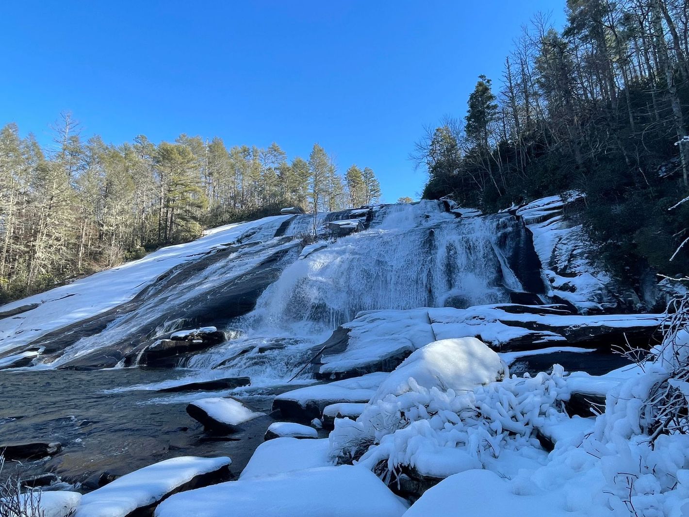 High Falls Waterfall with ice on it during Winter in Dupont State Forest, North Carolina.