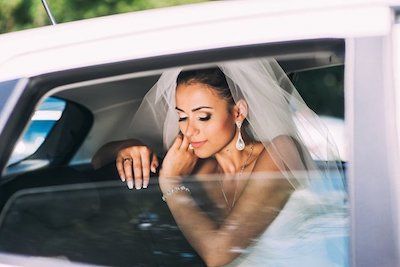 bride in a wedding limo rental