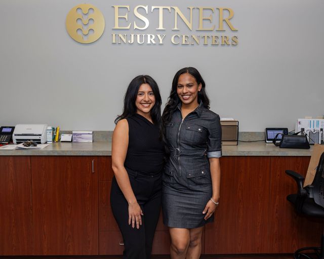 Two staff members that work at Estner Injury Centers