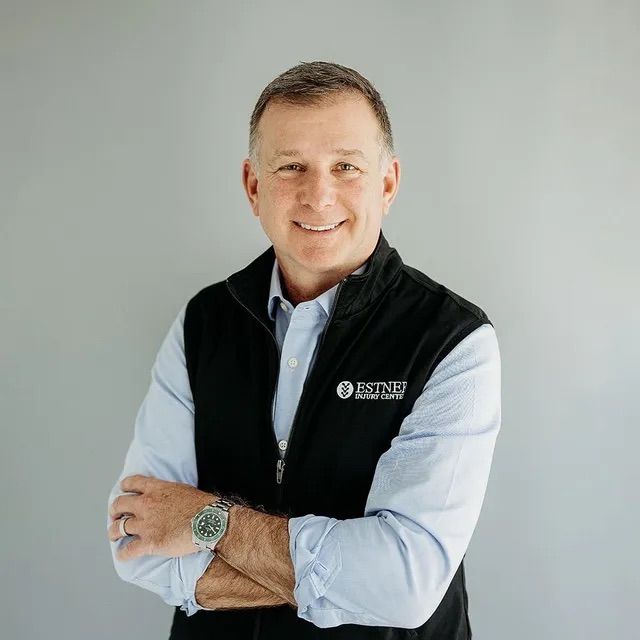 Dr. Estner posing for a picture