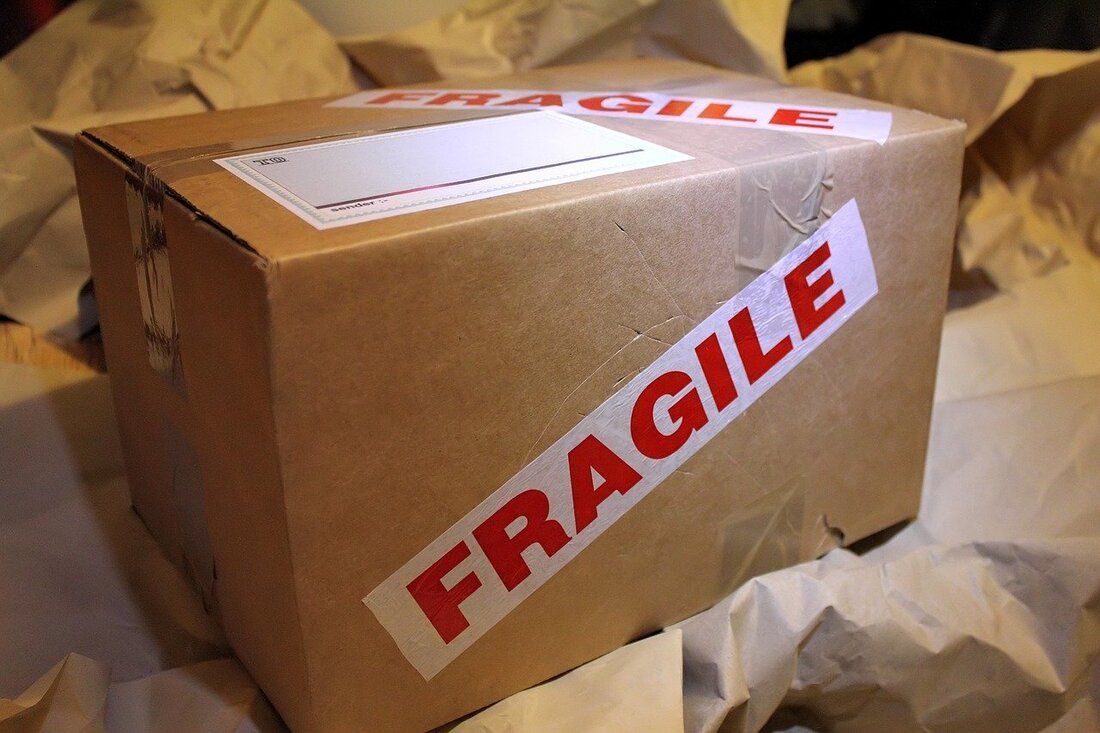 A cardboard box with fragile written on it