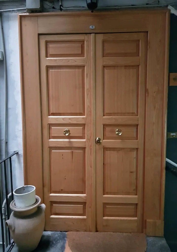 Porta d'ingresso in legno artigianale