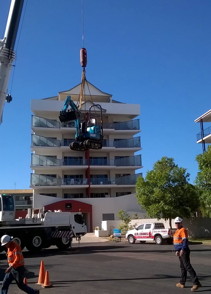 excavator being lifted