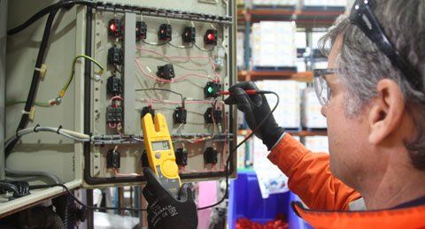 Turning on Switch — Electricians in Fullerton Cove, NSW