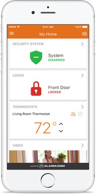 A cell phone with a thermostat app open on it.