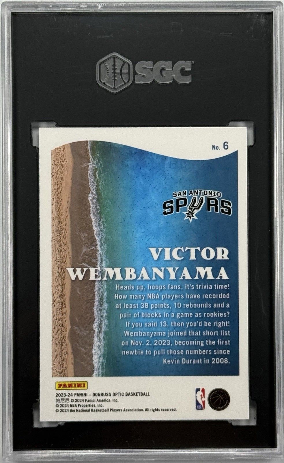2023-24 Donruss Optic Victor Wembanyama Splash! Rookie RC SGC 10 Spurs