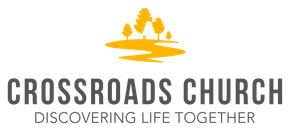 A logo for a church called crossroads church discovering life together.