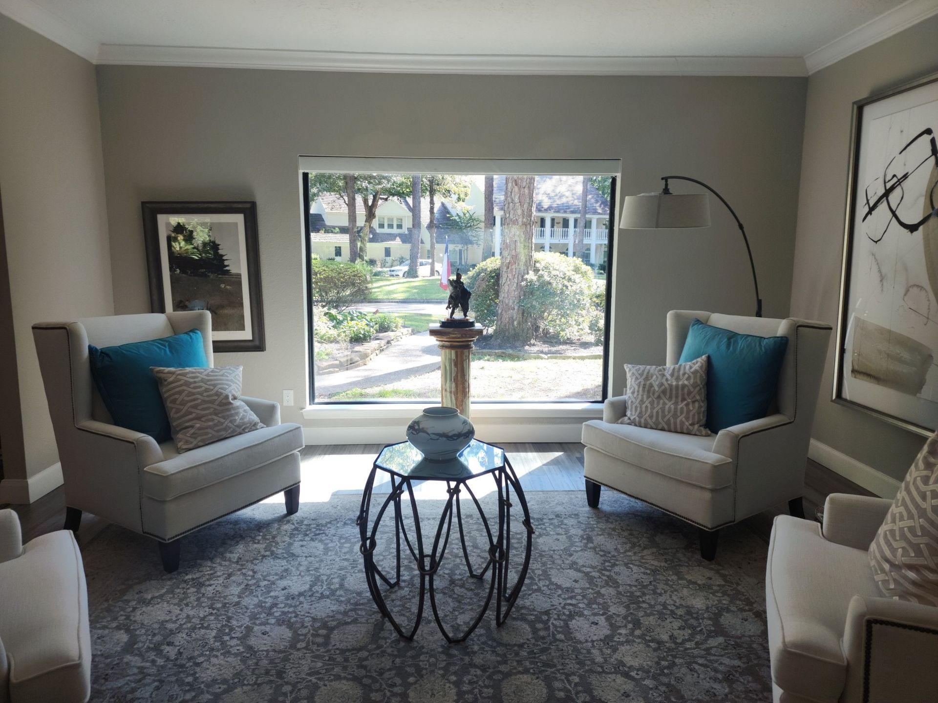 A living room with two chairs and a coffee table