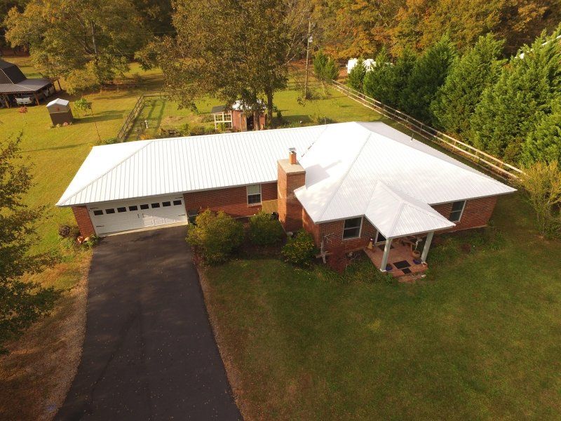 New Energy Star Metal Roof in Polar White, located in Social Circle