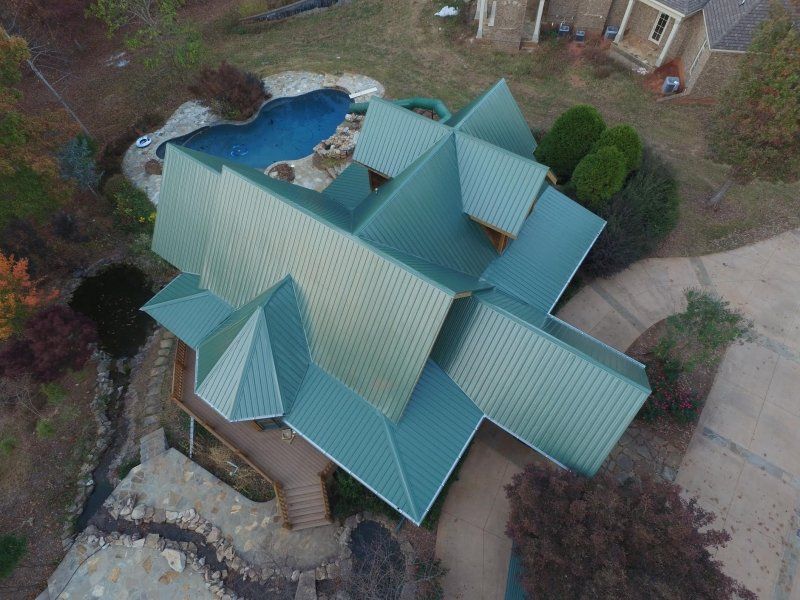 New metal roof in Monroe, 29 gauge Tuff Rib panels in Evergreen