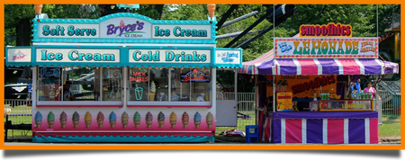 A lemonade stand sits next to an ice cream stand