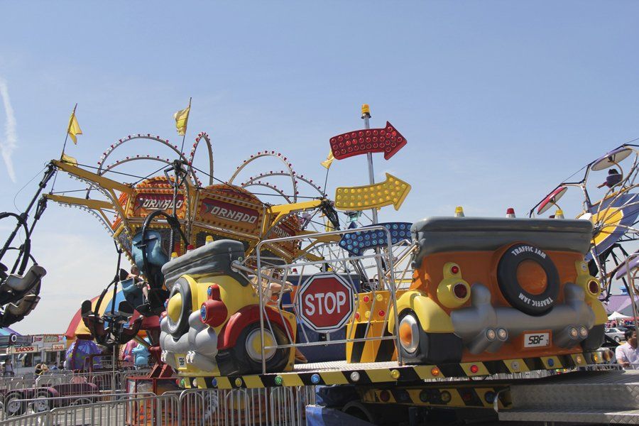 A carnival ride with a stop sign on it