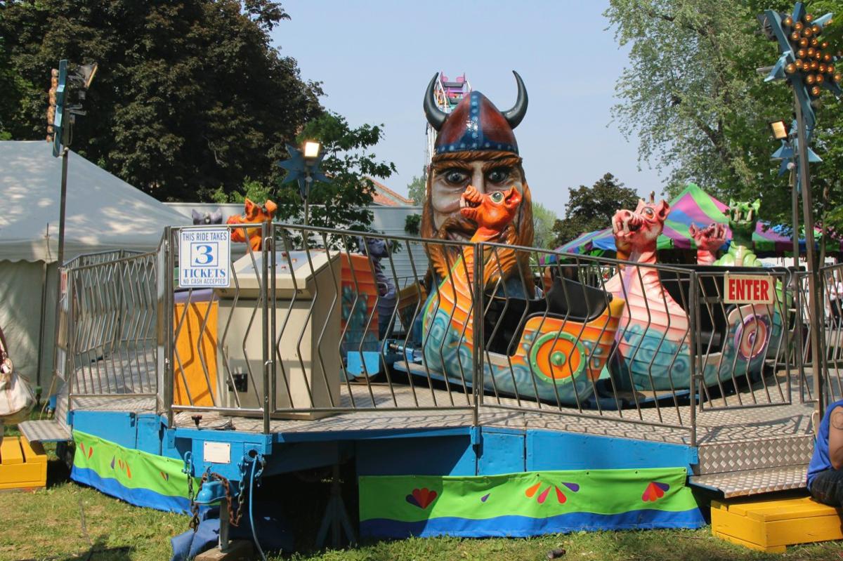 A carnival ride with a sign that says exit