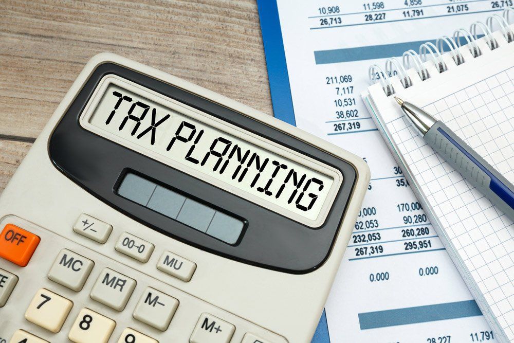 Calculator with Label Tax Planning — Bookkeeping in Bundaberg QLD