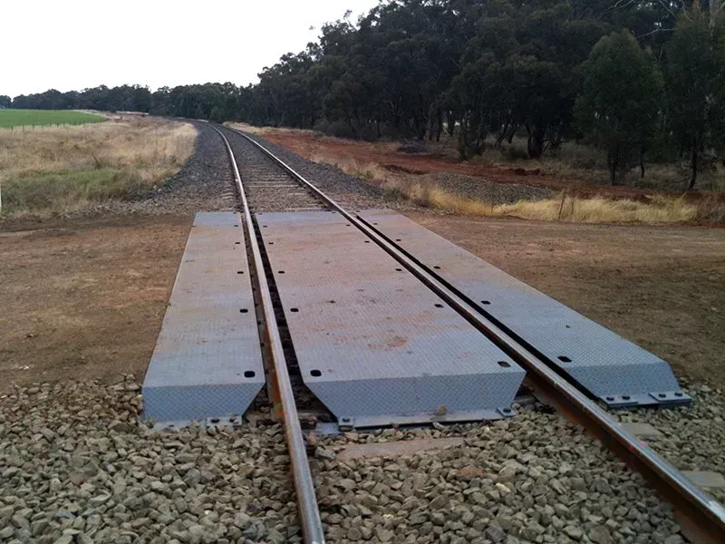 A Train Track With A Concrete Platform In The Middle — Agriweld Engineering in Dubbo, NSW