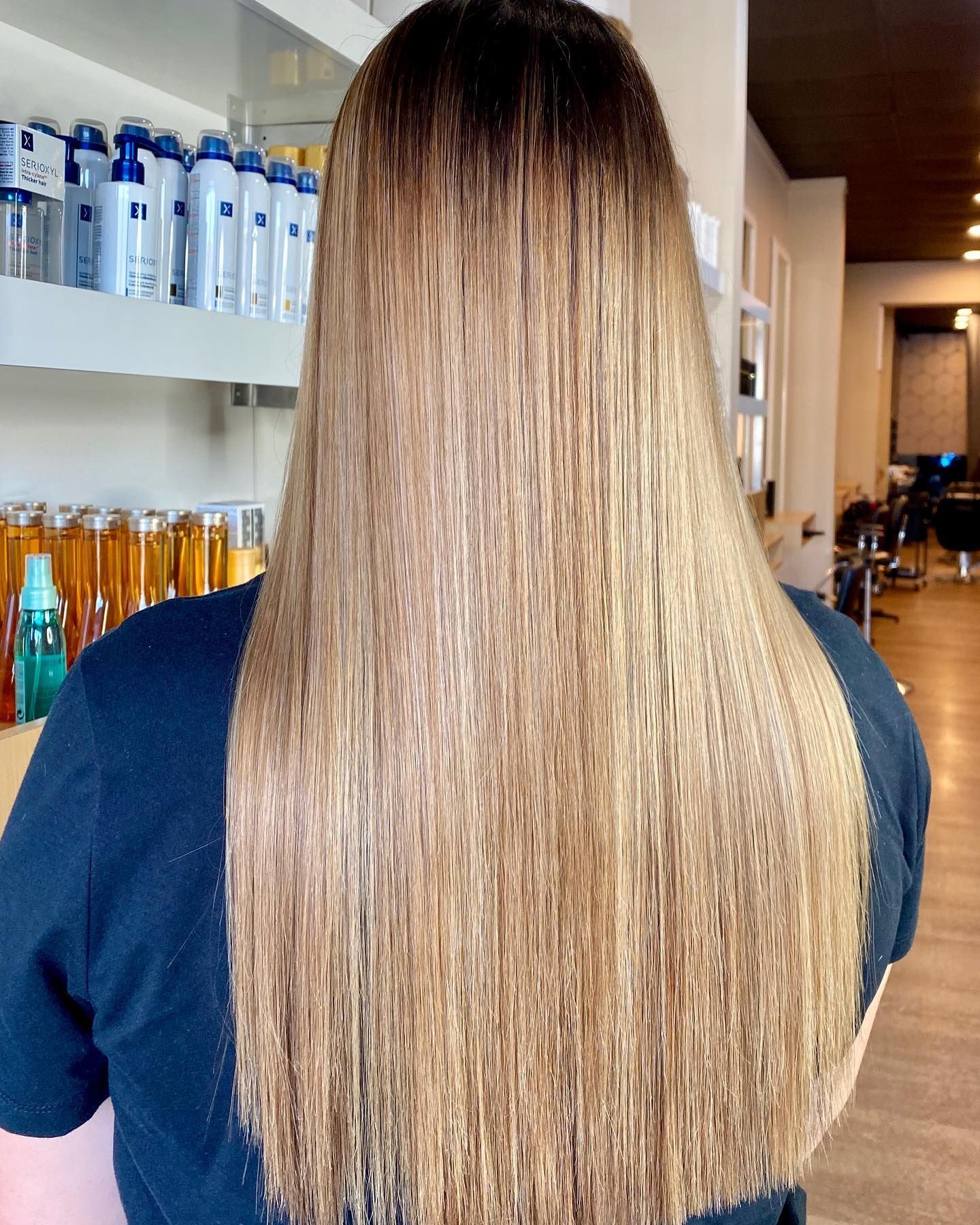 Woman With Wavy, Light Blonde Hair; Shoulder-length Style With Highlights — Gina T Hair & Beauty In Mackay, QLD