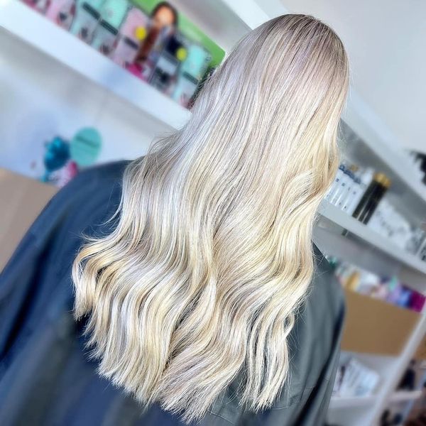 Woman With Long, Wavy, Light Blonde Hair, Styled From The Back — Gina T Hair & Beauty In Mackay, QLD
