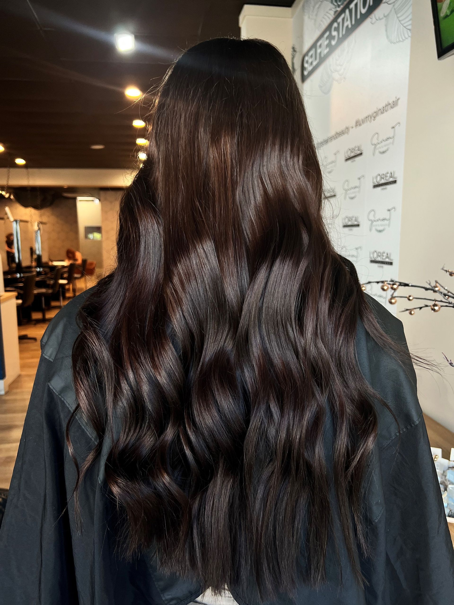 Woman With Long, Wavy, Platinum Blonde Hair In A Salon — Gina T Hair & Beauty In Mackay, QLD