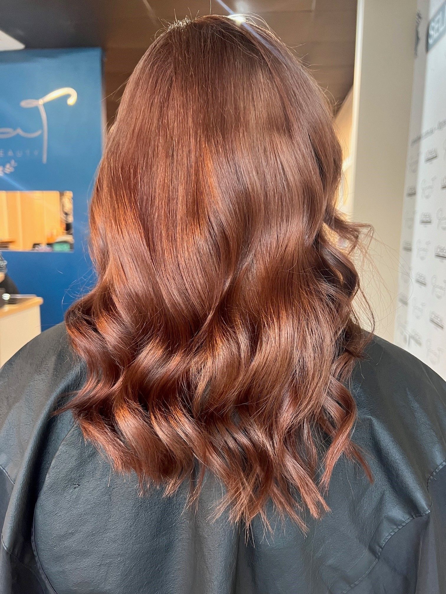 Woman With Reddish-brown Hair And A Shoulder-length Bob Haircut — Gina T Hair & Beauty In Mackay, QLD