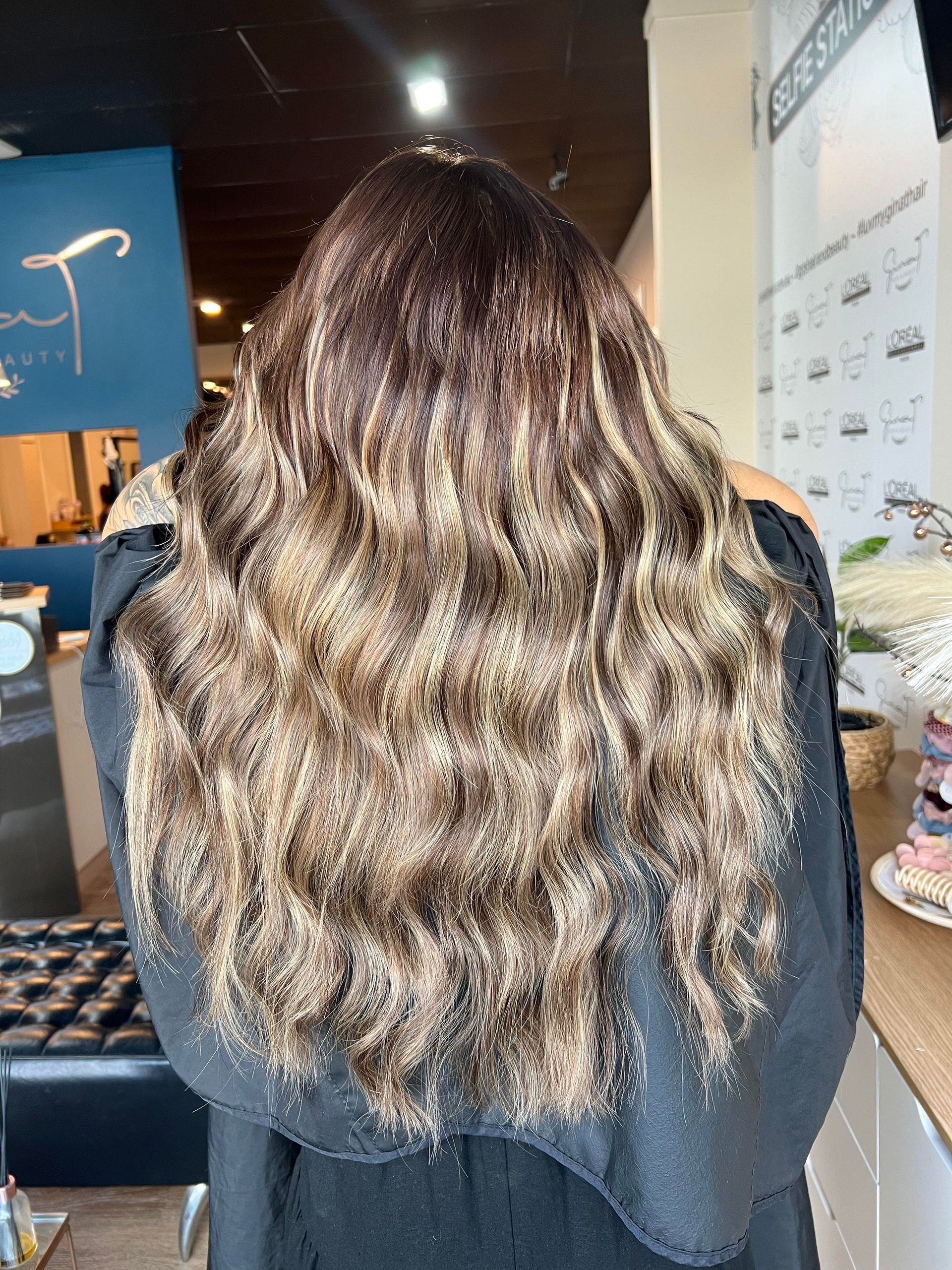 Woman With Long, Wavy, Reddish-brown Hair — Gina T Hair & Beauty In Mackay, QLD