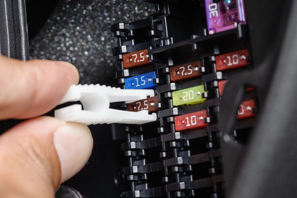 Checking Car Fuse Box — Evco Automotive in South Albury, NSW