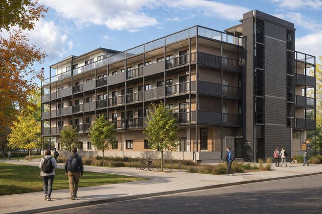 Modern multi-story apartment building with balconies, people walking on the lawn.