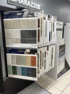 Worker levels a floor cement — Baileyton, AL — Walker Brothers