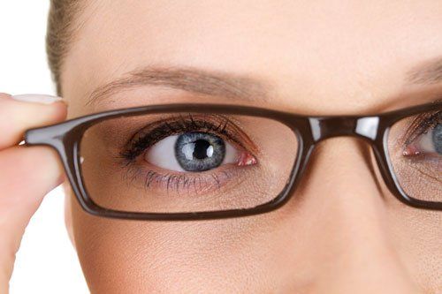 Toddler Glasses — Close Up Of Woman Wearing Eyeglasses in Eureka, CA