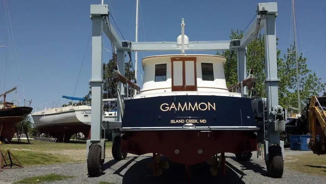 A boat with the name gammon on the back of it