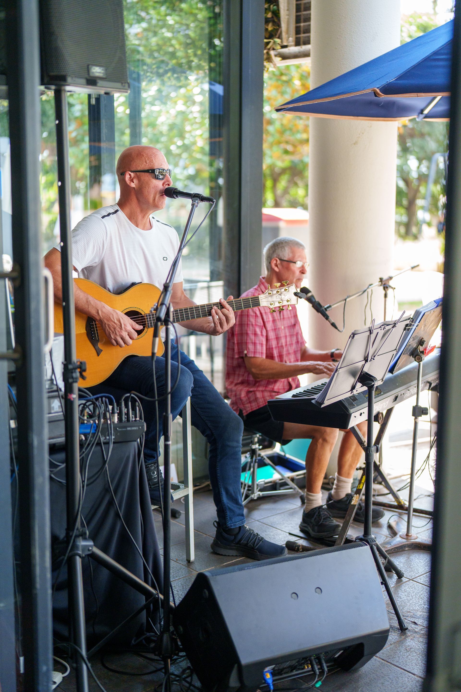 A Person Is Holding A Tray Of Food And A Bowl Of French Fries — Chop 'n Chill in Port Macquarie, NSW