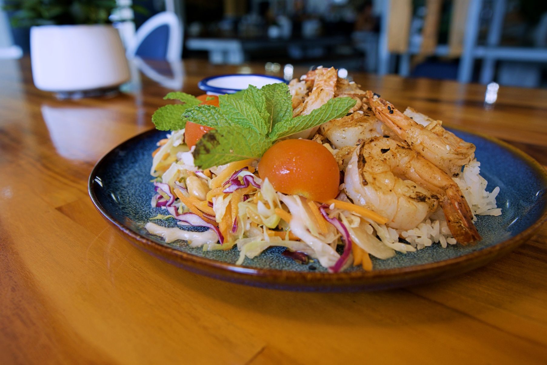 Seafood Dish on a Blue Plate: Shrimp, Rice, Slaw, Tomato — Chop 'n Chill in Port Macquarie, NSW